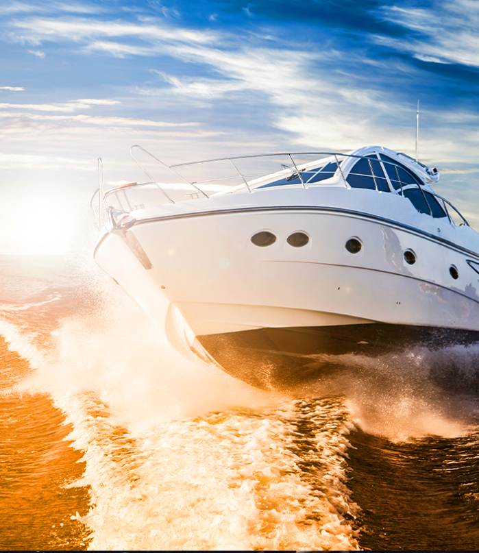 cropped view of car cleaner polishing headlamp with polish machine